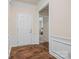 Bright and inviting foyer with hardwood floors and elegant trim, leading to other areas of the home at 984 Kirby Dr, Fort Mill, SC 29715