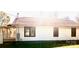 Side view of a white house with dark window frames at 1012 4Th St, Statesville, NC 28677