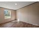Bedroom with neutral paint, carpet and window letting in natural light at 1128 Bethesda Rd, Statesville, NC 28677