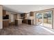 Contemporary kitchen with dark wood cabinets, sleek countertops, and access to an outdoor deck at 1128 Bethesda Rd, Statesville, NC 28677