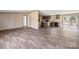 Spacious living area flowing into a modern kitchen with sleek countertops and stainless steel appliances at 1128 Bethesda Rd, Statesville, NC 28677
