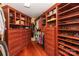 Walk-in closet featuring custom wood shelving, drawers, and hanging space at 1873 Farrow Dr, Rock Hill, SC 29732