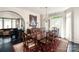 Formal dining room with large wooden table, elegant chairs, and classic decor at 1873 Farrow Dr, Rock Hill, SC 29732