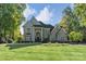Stately home featuring manicured lawn and elegant architectural details on a sunny day at 1873 Farrow Dr, Rock Hill, SC 29732