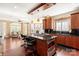 Stylish kitchen and breakfast nook, featuring custom cabinetry, island cooktop, and seamless flow into the living space at 1873 Farrow Dr, Rock Hill, SC 29732