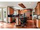Spacious kitchen with custom wood cabinetry, granite countertops, and a large island with bar seating at 1873 Farrow Dr, Rock Hill, SC 29732