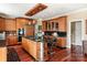 Gourmet kitchen featuring custom cabinetry, granite countertops, stainless steel appliances, and center island with bar at 1873 Farrow Dr, Rock Hill, SC 29732