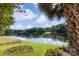 Scenic view of a calm lake reflecting the sky and surrounding trees at 1873 Farrow Dr, Rock Hill, SC 29732
