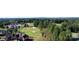 Aerial view of homes located on a golf course with mature trees at 3778 Rock Bridge Ne Dr, Conover, NC 28613