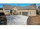 Exterior shot showing a beautiful brick home with an attached two car garage and concrete driveway at 3778 Rock Bridge Ne Dr, Conover, NC 28613