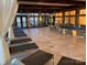 Tranquil indoor pool area with lounge chairs and stone accents at 3778 Rock Bridge Ne Dr, Conover, NC 28613