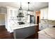 Modern kitchen featuring white cabinets, stainless steel appliances, and a marble countertop island at 3778 Rock Bridge Ne Dr, Conover, NC 28613