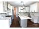 Spacious kitchen featuring white cabinets, stainless steel appliances, and marble countertops at 3778 Rock Bridge Ne Dr, Conover, NC 28613
