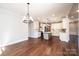 Spacious kitchen featuring marble countertops, white cabinets, and stainless steel appliances at 3778 Rock Bridge Ne Dr, Conover, NC 28613
