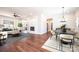 Living room with hardwood floors, comfortable seating, fireplace, and access to the dining area at 3778 Rock Bridge Ne Dr, Conover, NC 28613