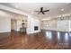 Open living space features hardwood floors, modern fireplace, and an open kitchen concept at 3778 Rock Bridge Ne Dr, Conover, NC 28613