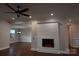 Bright living room with hardwood floors and ceiling fan at 3778 Rock Bridge Ne Dr, Conover, NC 28613