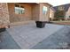 An outdoor patio area with stone pavers and space for entertaining at 3778 Rock Bridge Ne Dr, Conover, NC 28613