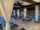 Elegant indoor poolside lounge with natural accents offers a relaxing retreat with an attractive waterfall feature at 3778 Rock Bridge Ne Dr, Conover, NC 28613