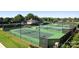 A view of the community tennis courts with a gazebo and well maintained landscaping at 3778 Rock Bridge Ne Dr, Conover, NC 28613