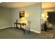 Lobby space with stylish decor, console table, and comfortable seating arrangement at 1300 Reece Rd # 302, Charlotte, NC 28209