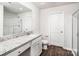 Bathroom boasts granite countertop, shower, and toilet at 3532 Clover Valley Dr, Gastonia, NC 28052