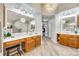 Elegant primary bathroom with double vanities, modern lighting, and wood-look tile floors at 6421 Chadwell Ct # 61, Fort Mill, SC 29707