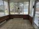 Sun-filled room with tile floor, many windows and views of the yard at 11311 Olde Turnbury Ct, Charlotte, NC 28277