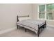 Bedroom with a black metal bed frame and patterned bedding at 1390 Cedardale Ln, Denver, NC 28037