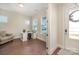 Bright home office with hardwood floors and built-in shelving at 1390 Cedardale Ln, Denver, NC 28037