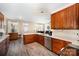 Open kitchen featuring stainless steel appliances, plenty of cabinetry and countertop space at 4741 Nijinsky Ct, Charlotte, NC 28216