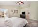 Spacious bedroom showcasing natural light, neutral wall color, and soft carpet flooring at 4741 Nijinsky Ct, Charlotte, NC 28216