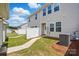 Townhome backyard with privacy fence and green grass at 939 Cobbled Way, Fort Mill, SC 29715