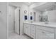 Double vanity bathroom with a large mirror at 939 Cobbled Way, Fort Mill, SC 29715