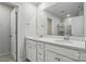 Modern bathroom with dual sinks and a large mirror at 939 Cobbled Way, Fort Mill, SC 29715