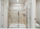 Modern bathroom with glass shower and tiled walls at 939 Cobbled Way, Fort Mill, SC 29715