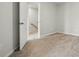 Carpeted bedroom featuring open door to hall at 939 Cobbled Way, Fort Mill, SC 29715