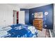 Bright bedroom with double bed and dresser at 939 Cobbled Way, Fort Mill, SC 29715