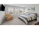 Spacious bedroom with king-size bed and armchair at 939 Cobbled Way, Fort Mill, SC 29715