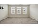 Bedroom with many windows at 939 Cobbled Way, Fort Mill, SC 29715