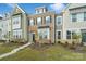 Modern three-story townhome with landscaping at 939 Cobbled Way, Fort Mill, SC 29715