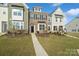 Modern three-story townhome with landscaping at 939 Cobbled Way, Fort Mill, SC 29715