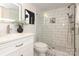 Modern bathroom with white subway tile and glass shower at 1422 Morningside Dr, Charlotte, NC 28205