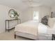 Light and airy bedroom with a king-size bed and window seat at 1422 Morningside Dr, Charlotte, NC 28205