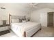 Bright bedroom featuring a king-size bed and ample closet space at 1422 Morningside Dr, Charlotte, NC 28205