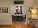 Inviting dining area with table and chairs, view into living room at 1422 Morningside Dr, Charlotte, NC 28205