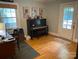 Bright office space with hardwood floors, piano, and backyard access at 1422 Morningside Dr, Charlotte, NC 28205