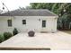 Large patio with firepit and string lights at 1422 Morningside Dr, Charlotte, NC 28205