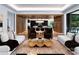 Open-concept living room featuring stylish furniture, hardwood floors, and seamless connection to the kitchen at 2116 Woodhaven Rd, Charlotte, NC 28211