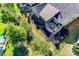 An aerial view of the backyard featuring landscaping, a patio, and an enclosed porch at 4023 Home Grown Way, Lake Wylie, SC 29710